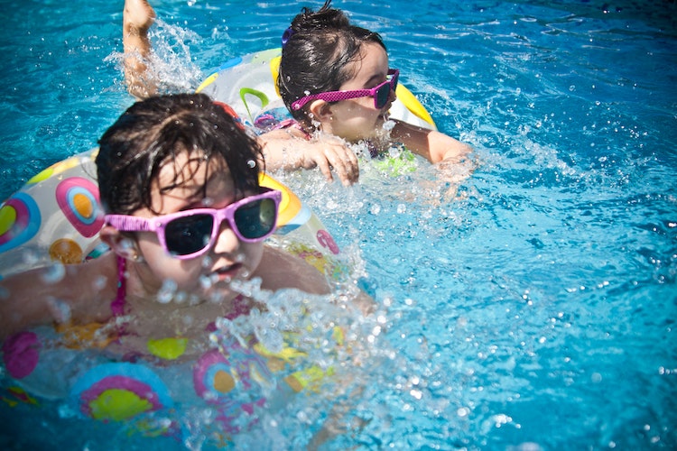 kids swimming in pool